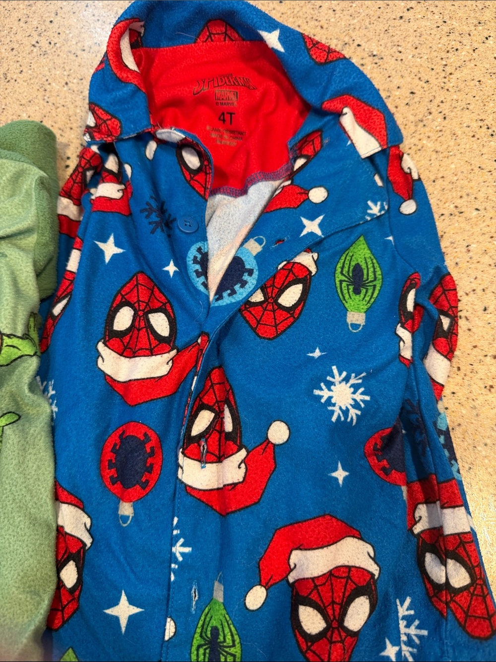 4 sets of kids pjs. Loose fitting 4T and snug fit 5T.